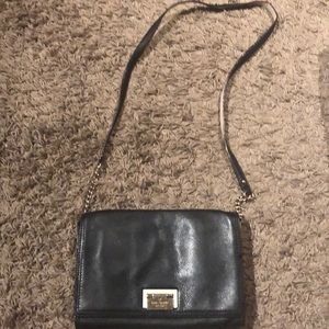 Kate Spade black purse with white and silver.